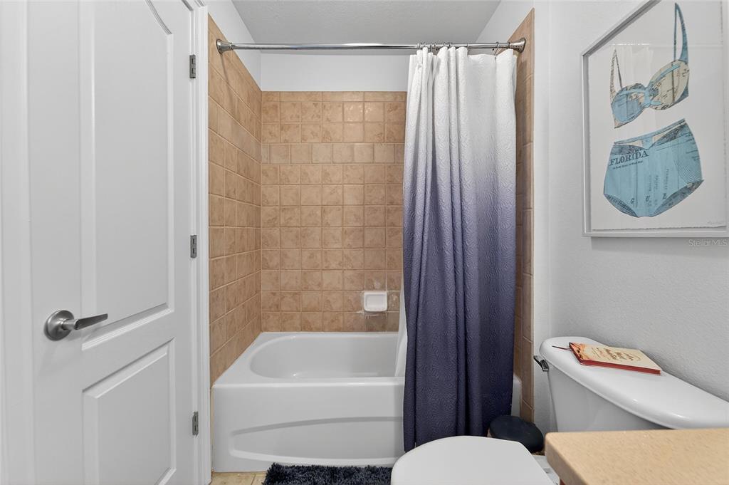 6428 Sunset Bay Circle Apollo Beach, FL 33572 - Photo 52 of 90 a bathroom with a toilet a sink and shower