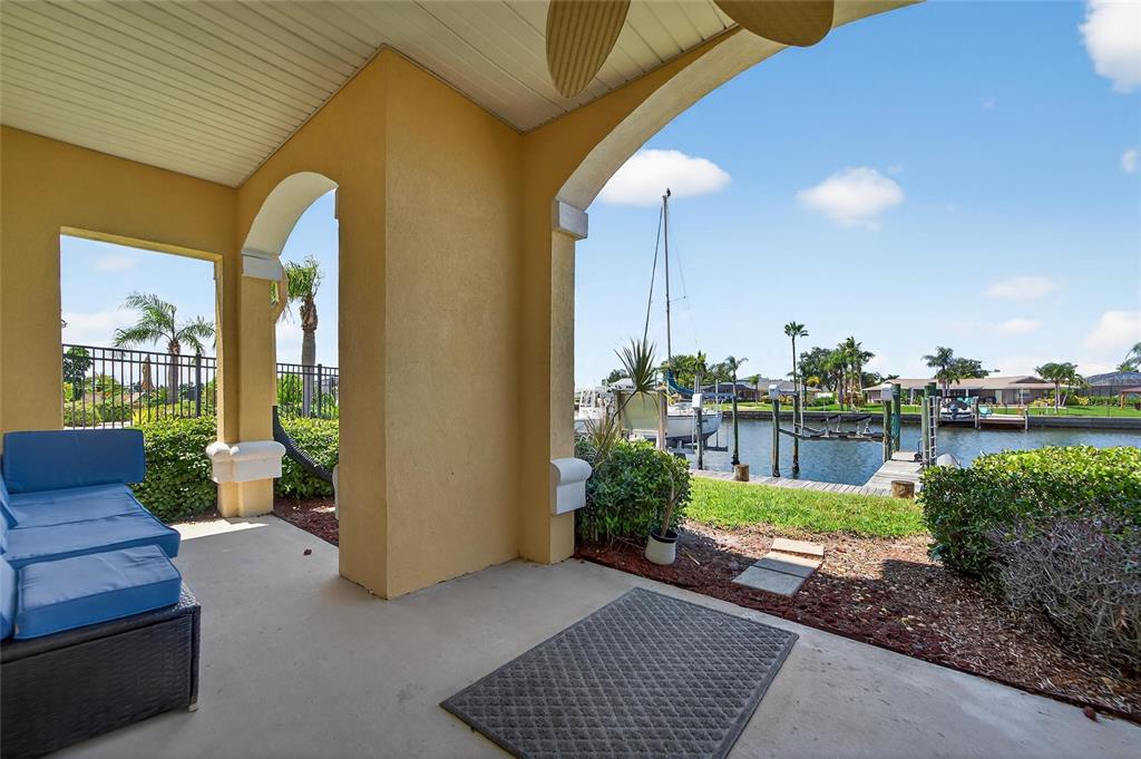 6428 Sunset Bay Circle Apollo Beach, FL 33572 - Photo 67 of 90 a view of a porch with furniture and garden