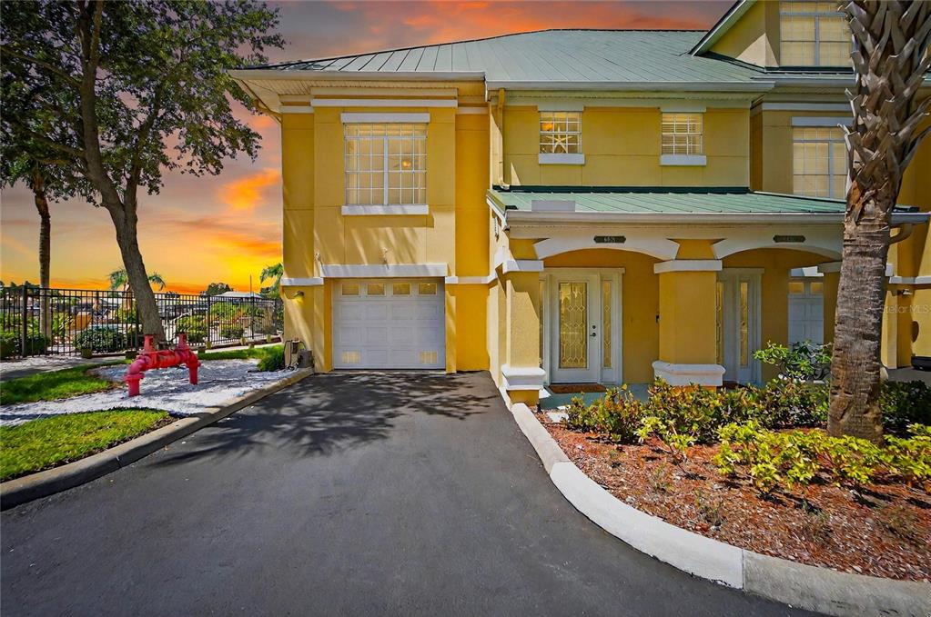6428 Sunset Bay Circle Apollo Beach, FL 33572 - Photo 7 of 90 a front view of a house with garden