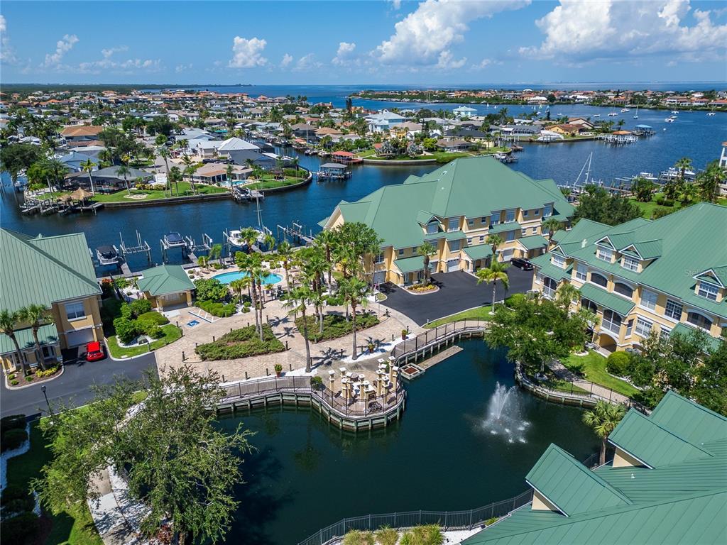 6428 Sunset Bay Circle Apollo Beach, FL 33572 - Photo 77 of 90 an aerial view of a house with a garden