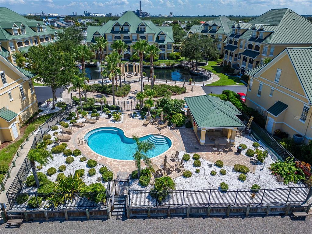 6428 Sunset Bay Circle Apollo Beach, FL 33572 - Photo 80 of 90 an aerial view of a house with yard swimming pool and outdoor seating