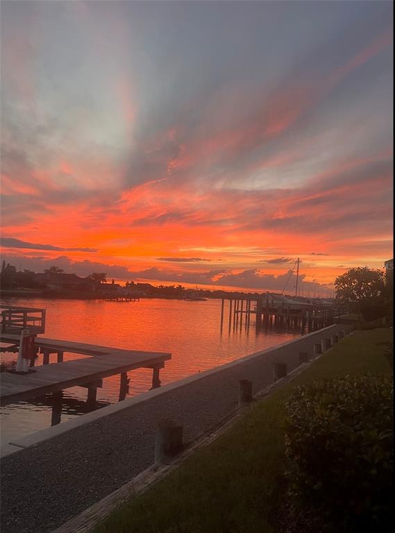 6428 Sunset Bay Circle Apollo Beach, FL 33572 - Photo 90 of 90 a view of a lake with table and chairs