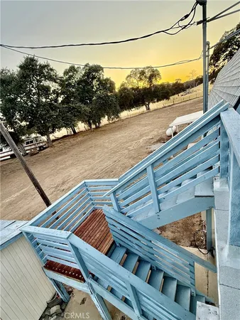 a view of a terrace with a lake view