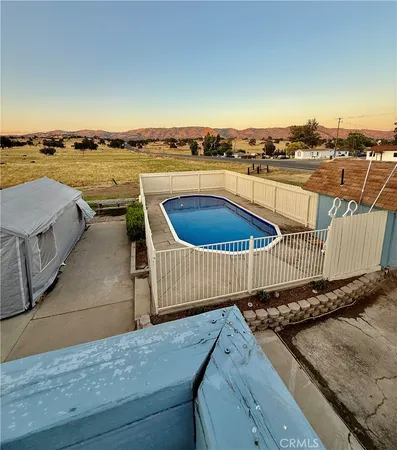 a view of a wooden fence
