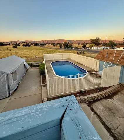 a view of a wooden fence