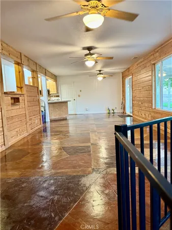 a swimming pool with the view of the house