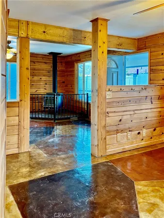 a kitchen with stainless steel appliances granite countertop a stove and a refrigerator
