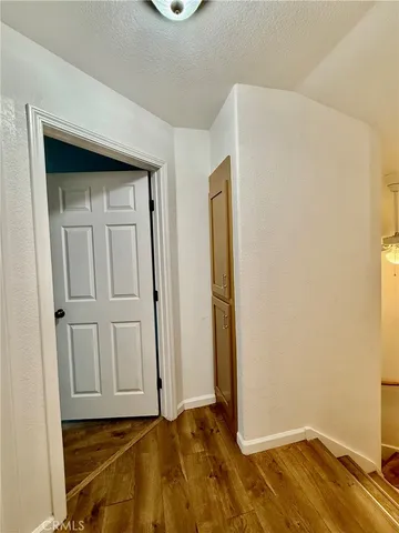 a view of a house with a big yard and garage