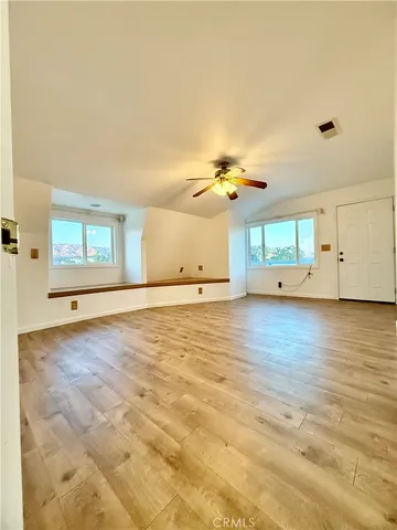 a view of a backyard of the house