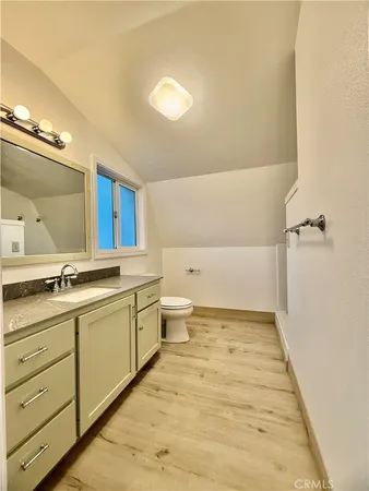 a view of a backyard of the house