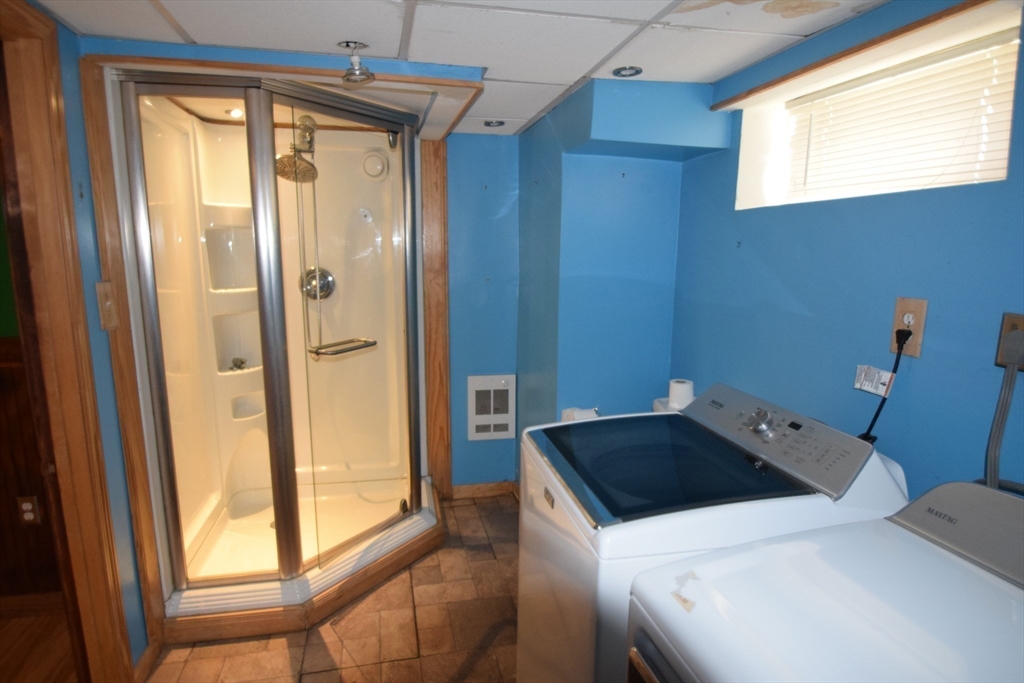 71 Rockefeller Street Randolph, MA 02368 - Photo 14 of 23 a bathroom with a sink and a mirror
