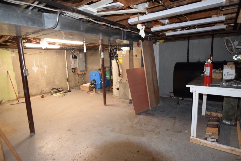 71 Rockefeller Street Randolph, MA 02368 - Photo 16 of 23 a view of a room with gym equipment