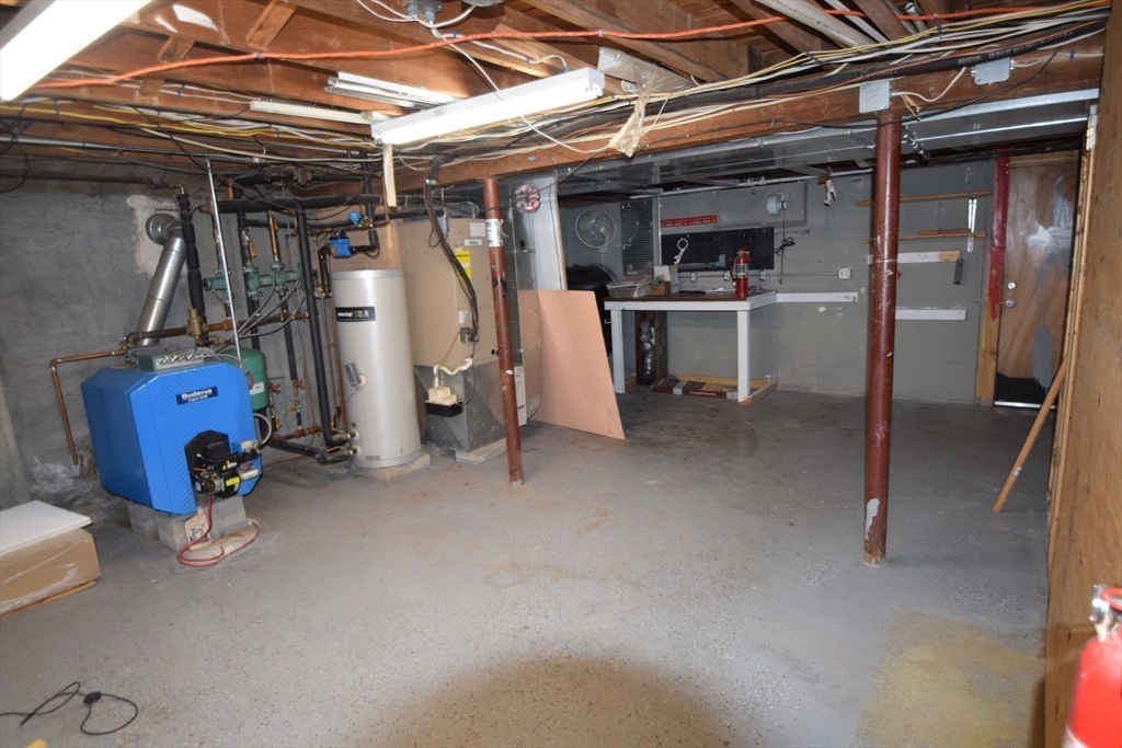 71 Rockefeller Street Randolph, MA 02368 - Photo 17 of 23 a view of a room with gym equipment