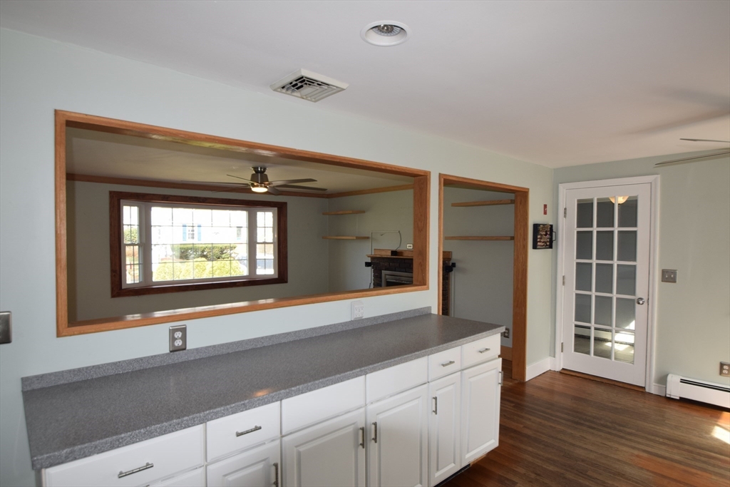 71 Rockefeller Street Randolph, MA 02368 - Photo 4 of 23 a bathroom with a sink and a large mirror