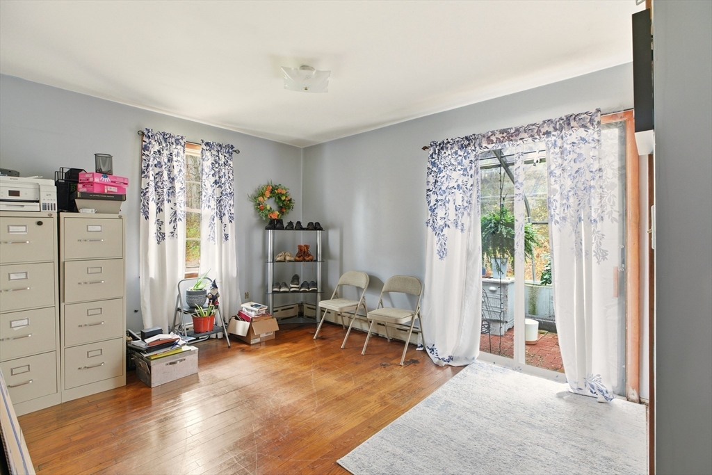 507 R Stafford Road Tiverton, RI 02878 - Photo 14 of 38 a view of a livingroom with workspace and a window