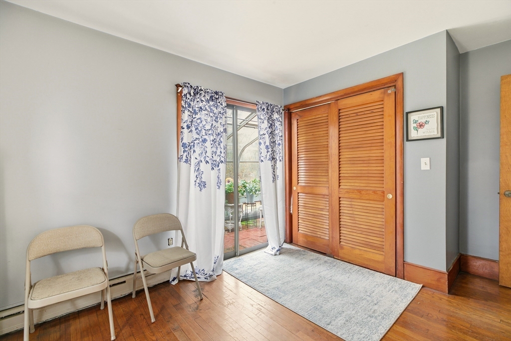 507 R Stafford Road Tiverton, RI 02878 - Photo 15 of 38 a view of a livingroom with furniture and wooden floor