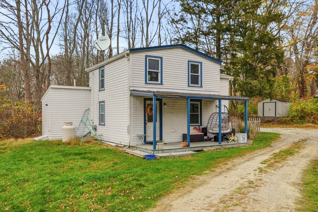 507 R Stafford Road Tiverton, RI 02878 - Photo 24 of 38 a view of a house with backyard porch and sitting area
