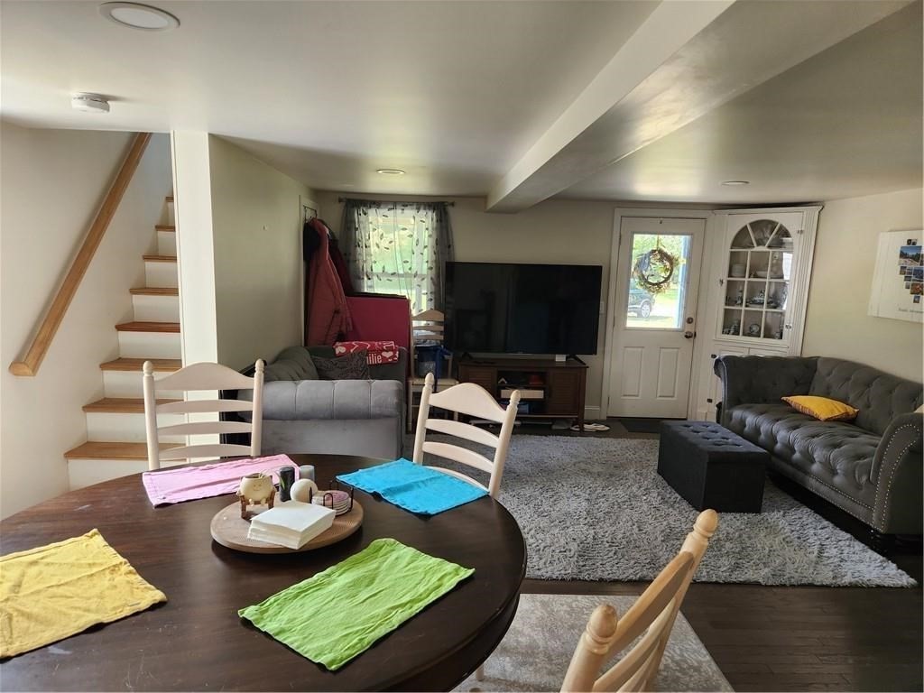 507 R Stafford Road Tiverton, RI 02878 - Photo 26 of 38 a living room with furniture and a flat screen tv