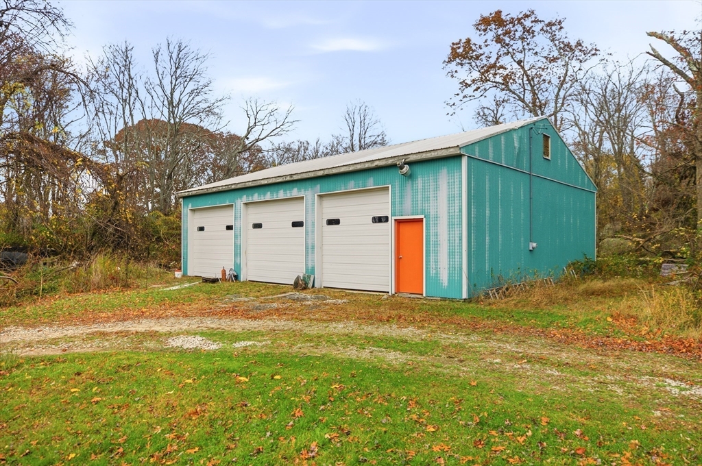 507 R Stafford Road Tiverton, RI 02878 - Photo 32 of 38 a view of a backyard of the house