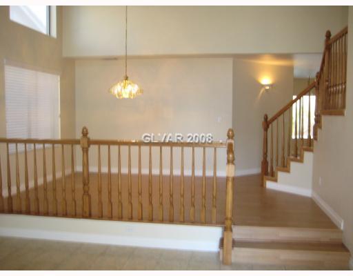 1759 Quiver Point Avenue Henderson, NV 89012 - Photo 12 of 12 Dining Room. Elevated dining area! Open and spacious floorplan! Hardwood flooring throughout!