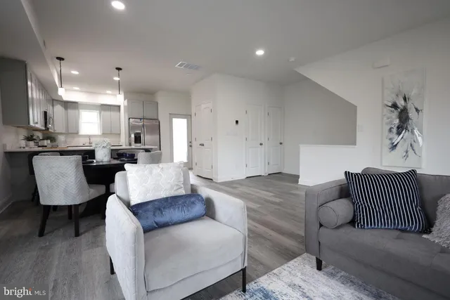 a living room with furniture and a couch