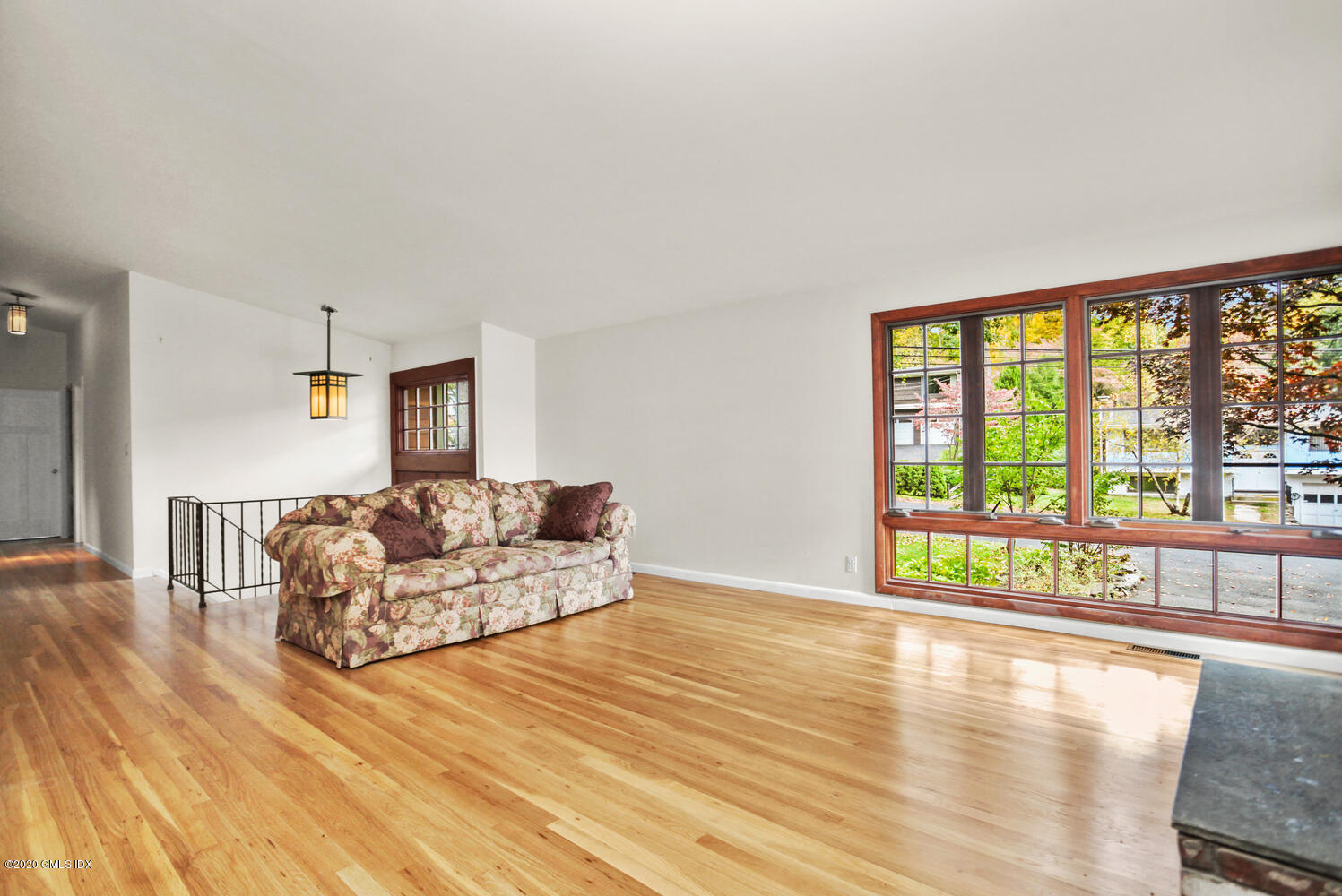 39 Crawford Terrace Riverside, CT 06878 - Photo 2 of 37 a living room with furniture and a large window