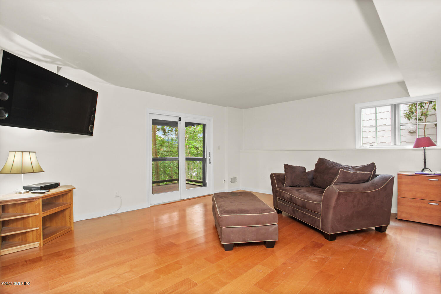 39 Crawford Terrace Riverside, CT 06878 - Photo 23 of 37 a living room with furniture and a flat screen tv