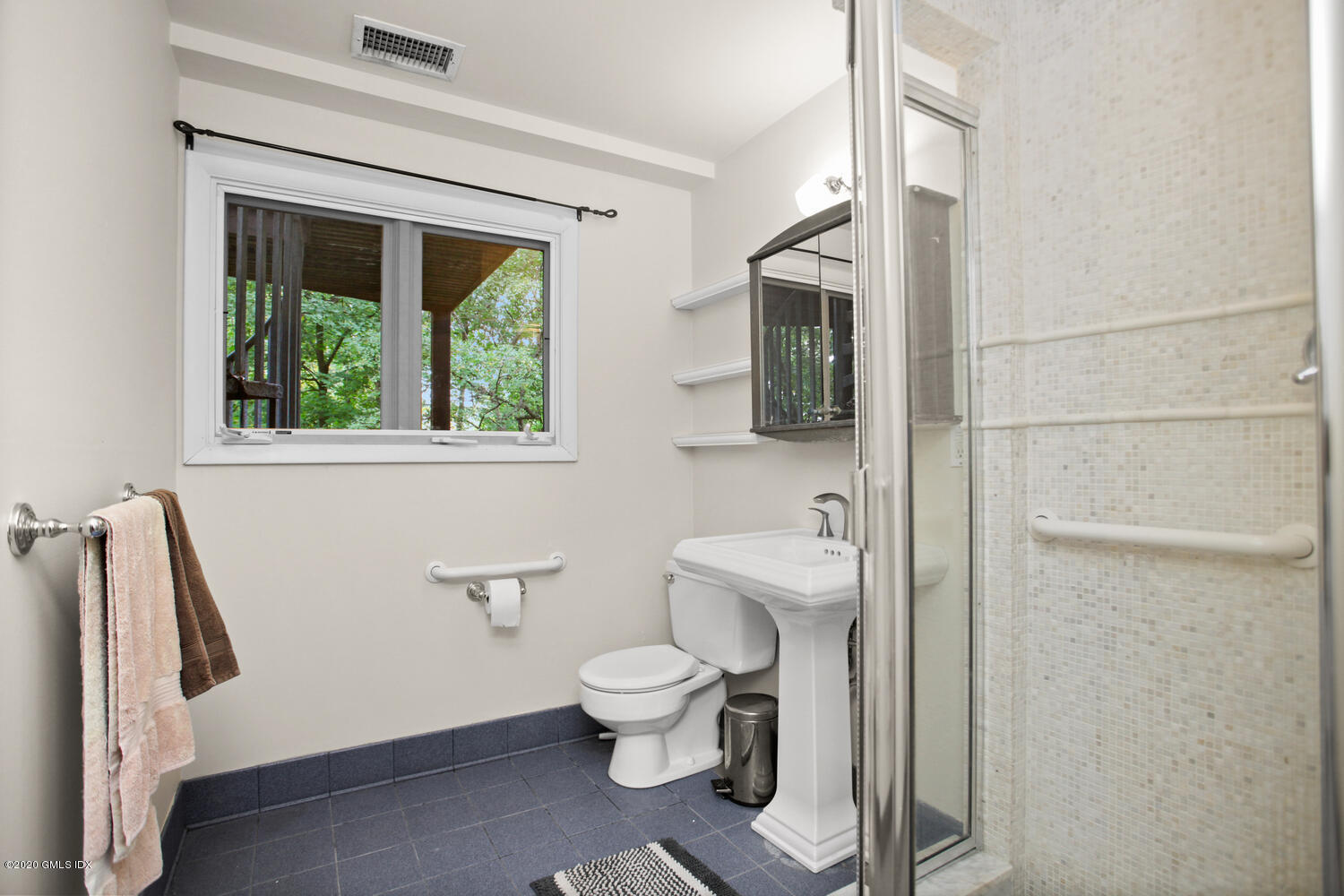 39 Crawford Terrace Riverside, CT 06878 - Photo 26 of 37 a bathroom with a toilet a sink and a window