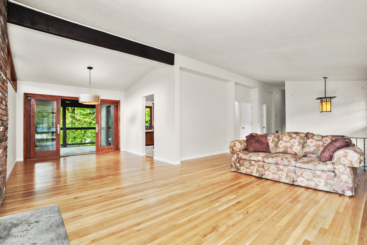 39 Crawford Terrace Riverside, CT 06878 - Photo 5 of 37 a living room with furniture and a large window