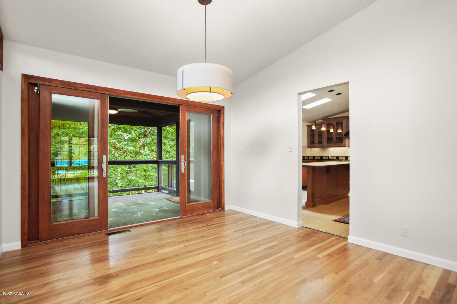39 Crawford Terrace Riverside, CT 06878 - Photo 9 of 37 a view of livingroom with hardwood floor and a ceiling fan