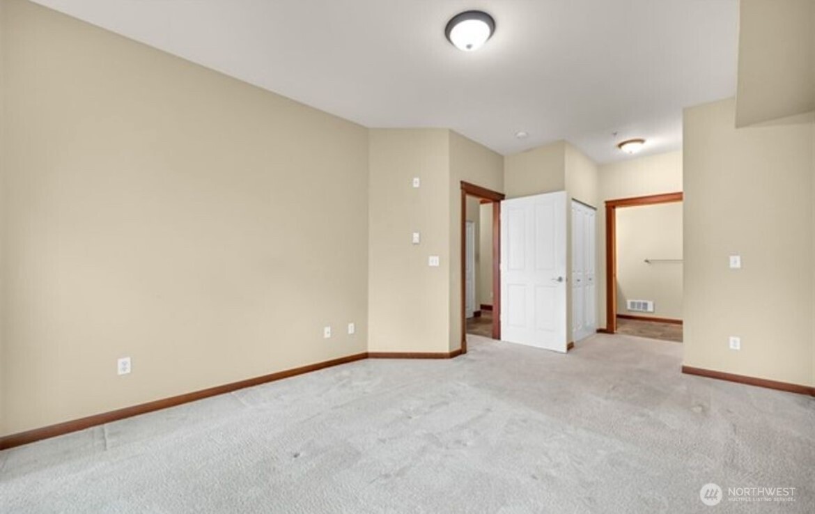 259 West Bakerview Road, Unit C102 Bellingham, WA 98226 - Photo 13 of 29 an empty room with a bathroom