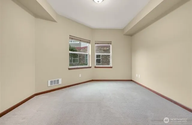 an empty room with windows