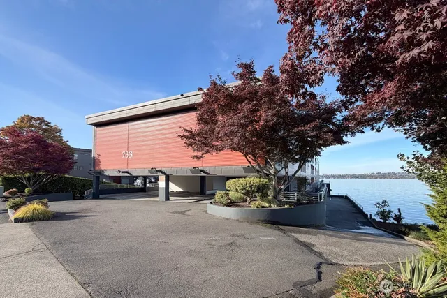 a view of house with outdoor space and street view