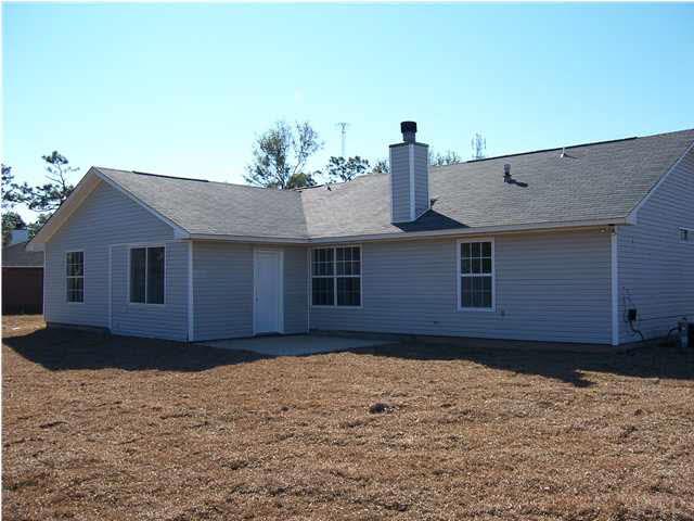 900 Ridge View Lane Pensacola, FL 32514 - Photo 7 of 10 PATIO OFF BONUS ROOM FEATURING A HUGE BACK YARD