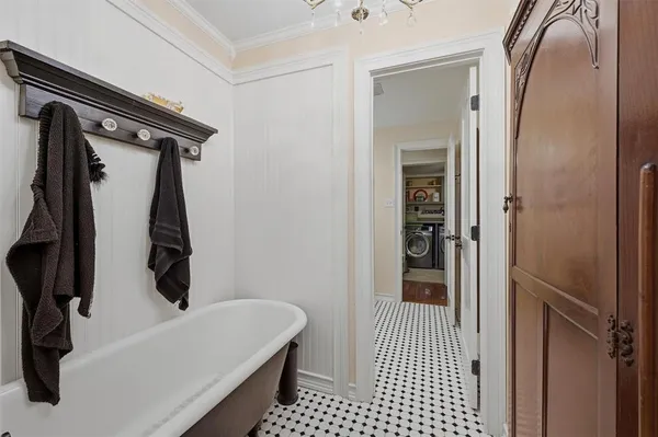 a bathroom with a sink and glass door