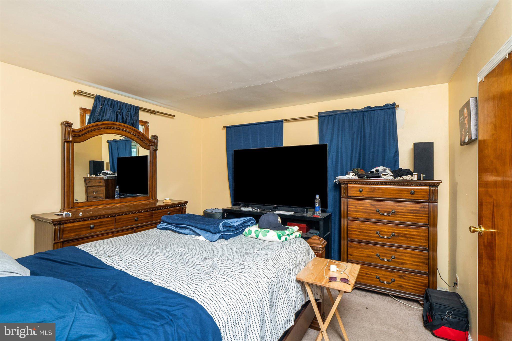 319 Station Road Roebling, NJ 08554 - Photo 12 of 15 a bedroom with a bed and furniture