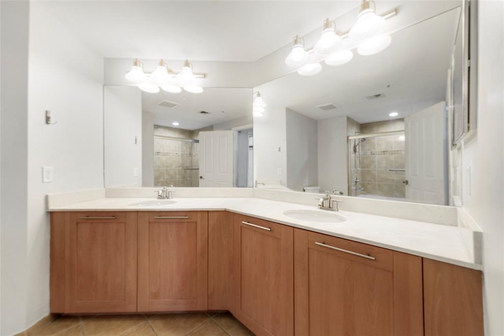 511 Southeast 5th Avenue, Unit 1116 Fort Lauderdale, FL 33301 - Photo 29 of 45 a bathroom with a sink double vanity and a mirror