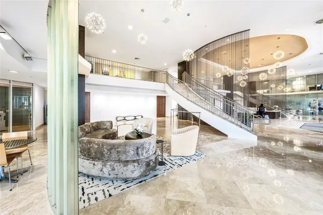 a view of living room kitchen and dining room