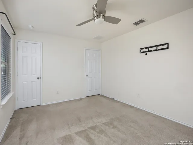 a view of a room with rack on the wall