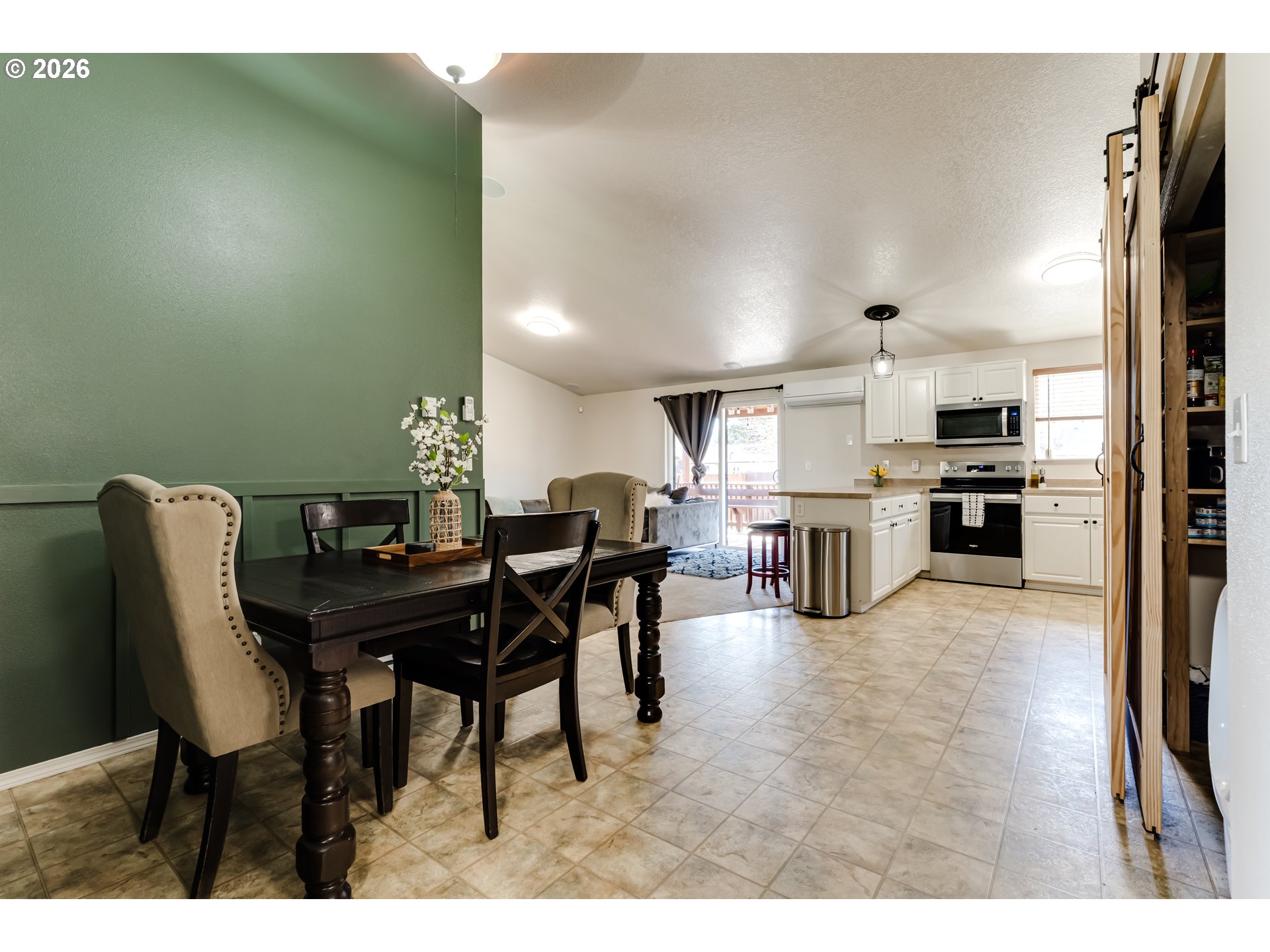 549 Gilfry Avenue Creswell, OR 97426 - Photo 13 of 44 a view of a dining room with furniture