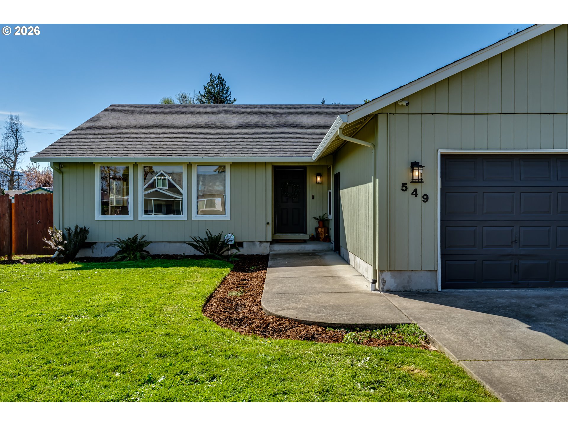 549 Gilfry Avenue Creswell, OR 97426 - Photo 2 of 44 a view of a house with backyard and porch