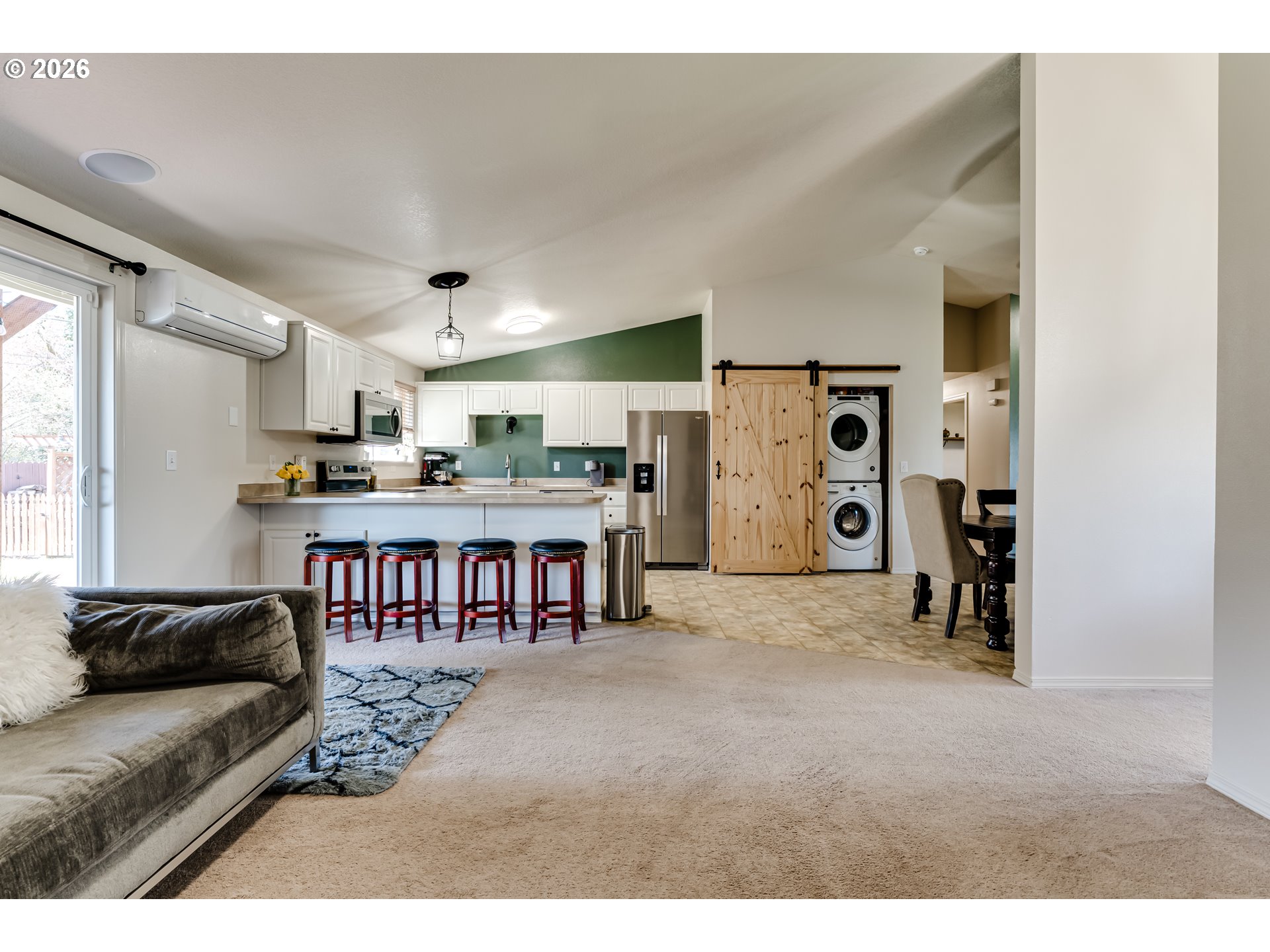 549 Gilfry Avenue Creswell, OR 97426 - Photo 21 of 44 a living room with stainless steel appliances kitchen island granite countertop furniture and a large window