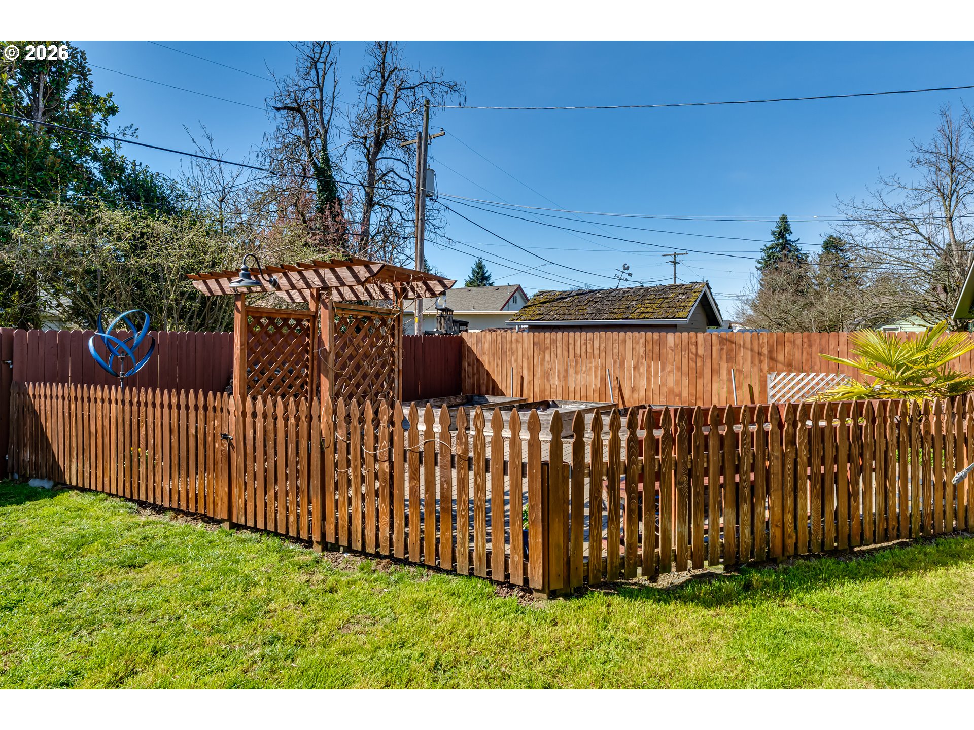 549 Gilfry Avenue Creswell, OR 97426 - Photo 36 of 44 a view of a backyard with wooden fence