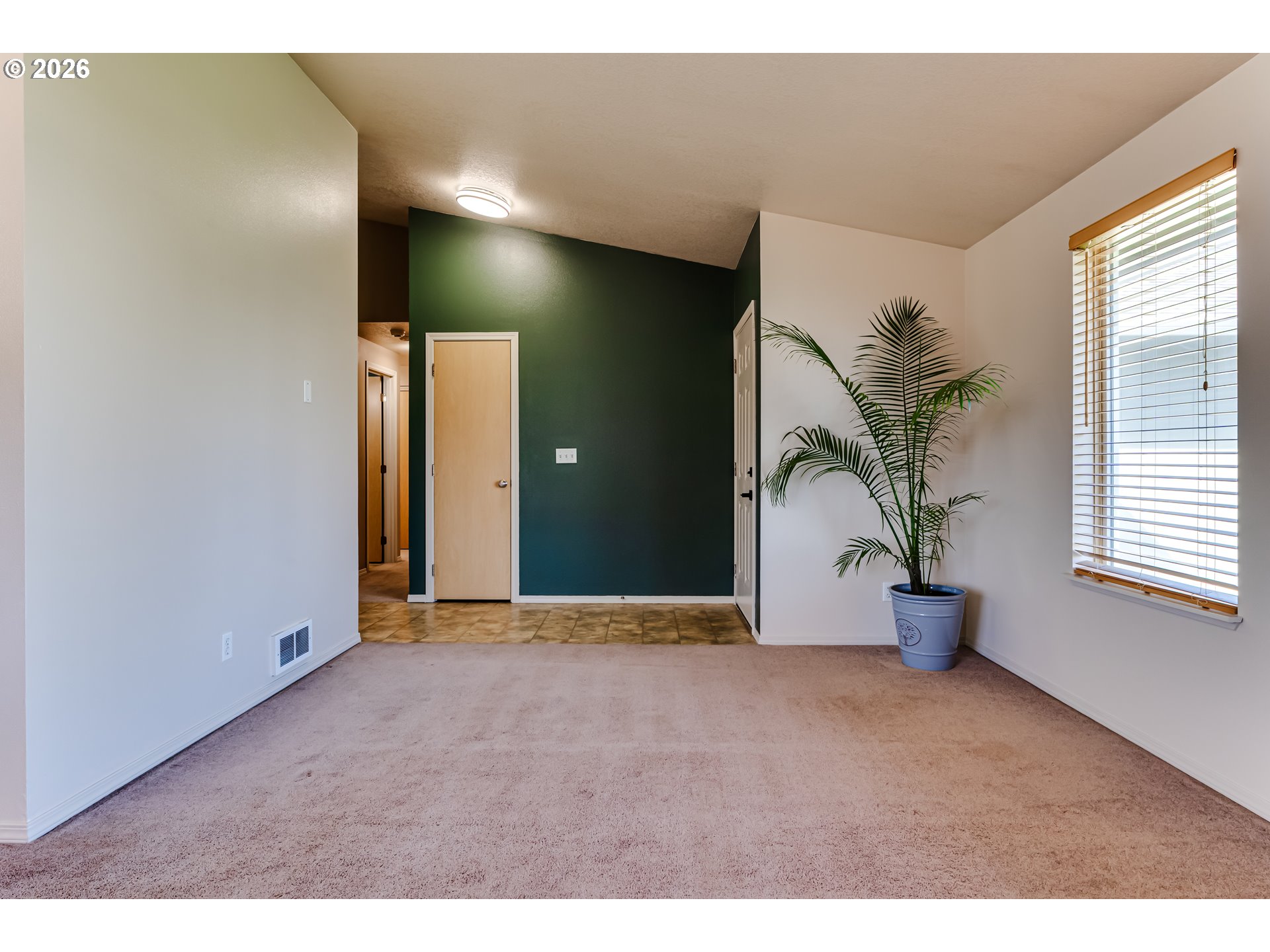 549 Gilfry Avenue Creswell, OR 97426 - Photo 7 of 44 a view of an empty room with a window