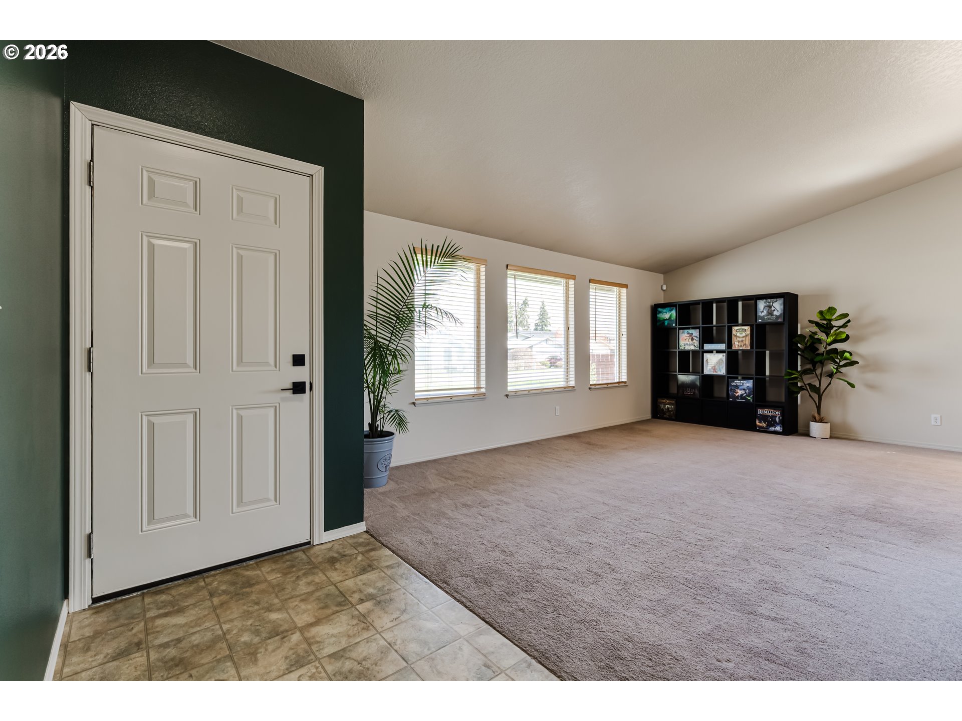 549 Gilfry Avenue Creswell, OR 97426 - Photo 8 of 44 a view of empty room with furniture and natural light