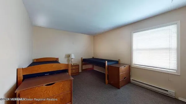 a room with furniture and a window