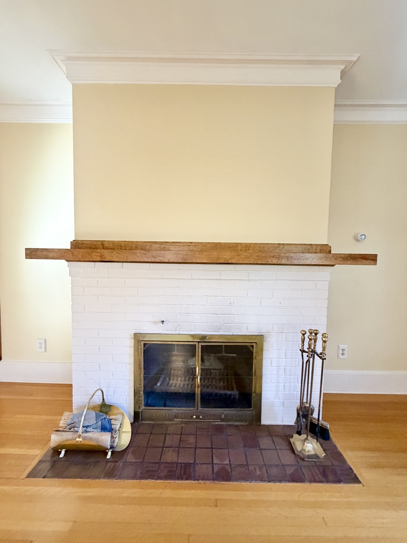 841 Douglas Avenue Elgin, IL 60120 - Photo 16 of 75 a living room with furniture and a fireplace