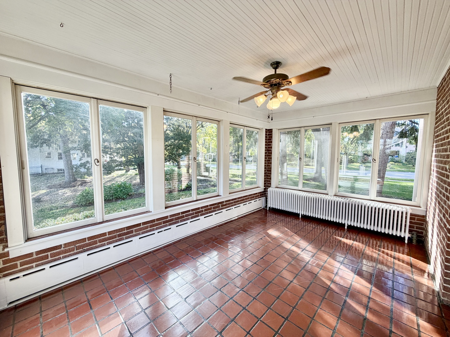 841 Douglas Avenue Elgin, IL 60120 - Photo 17 of 75 a view of empty room with wooden floor and fan