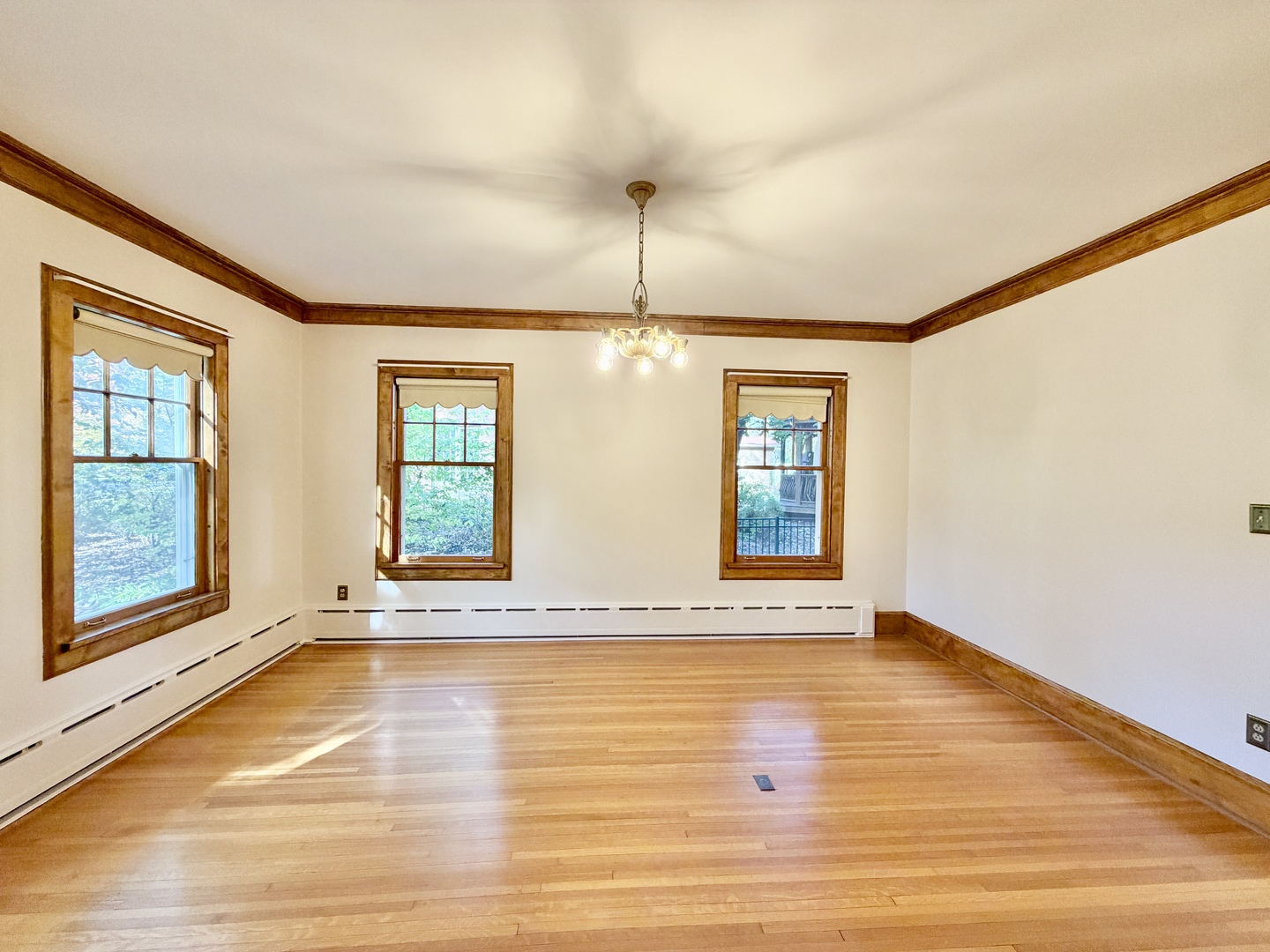 841 Douglas Avenue Elgin, IL 60120 - Photo 21 of 75 a view of an empty room with wooden floor and a window