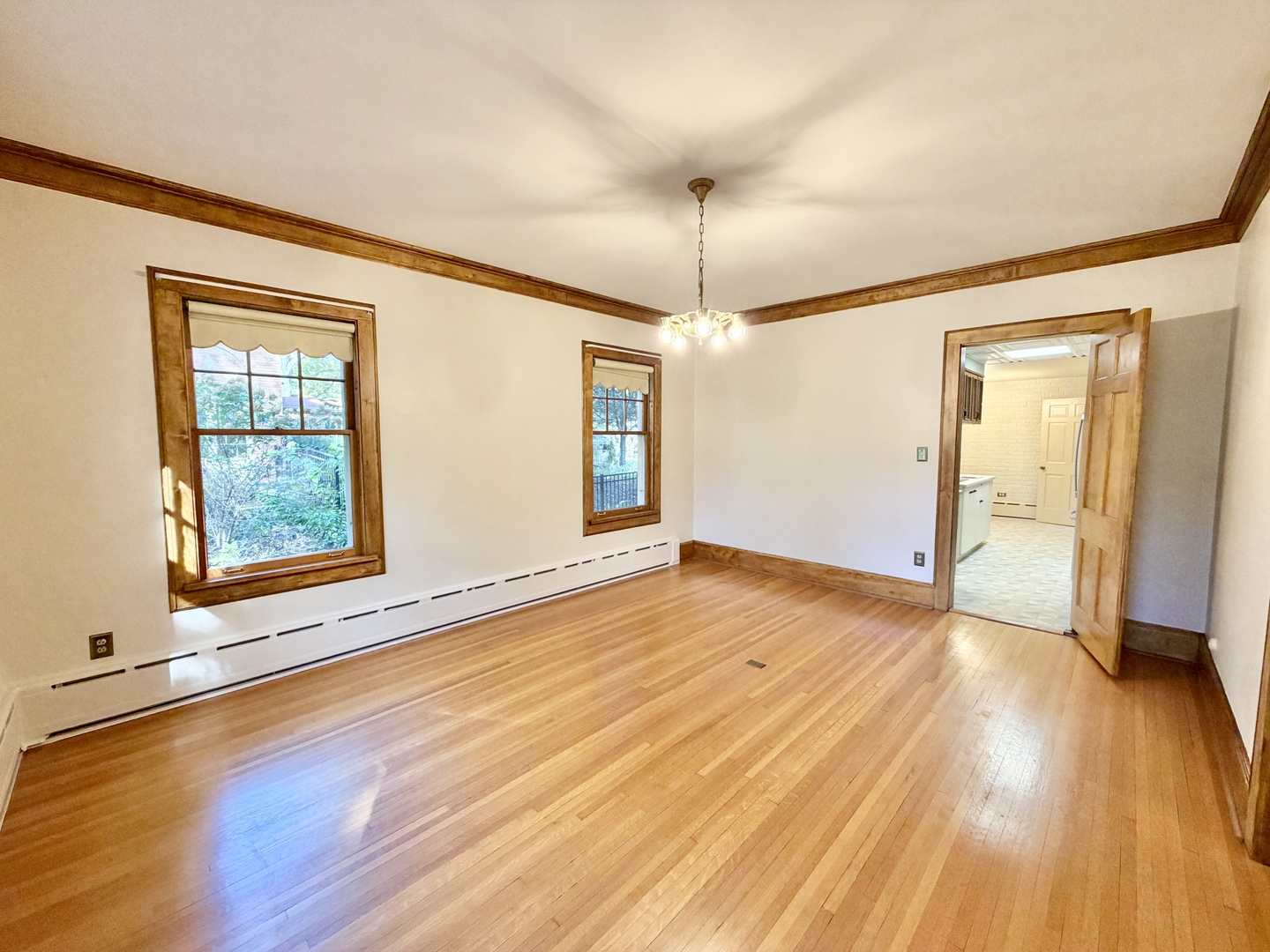 841 Douglas Avenue Elgin, IL 60120 - Photo 22 of 75 an empty room with wooden floor and windows